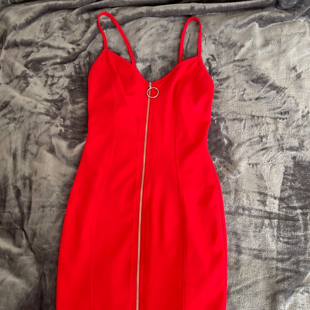 Hot red short zippered dress.